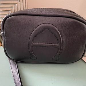 Black, leather, mini crossbody bag.